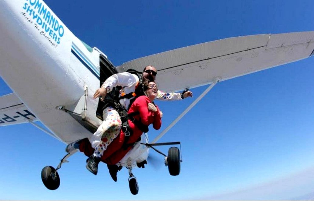 Commando Skydivers tandem skydive exiting plane