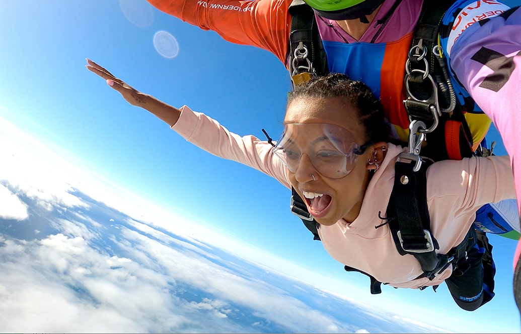 Tandem master and student in freefall.