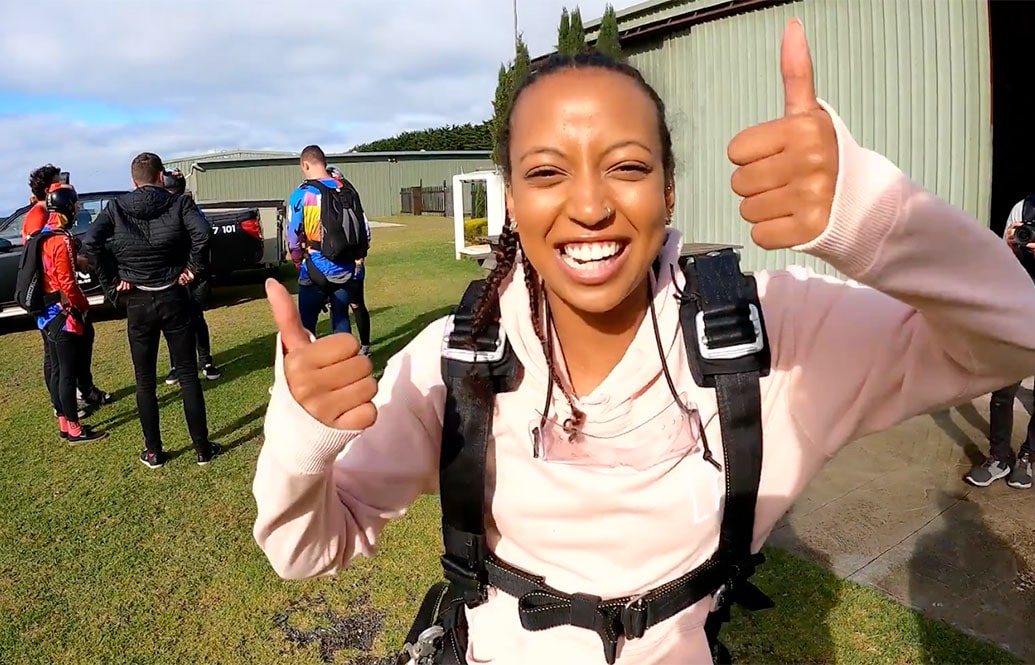 Chelsea about to go skydiving with her team.